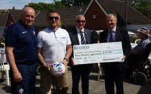 Bolton Wanderers hand over cheque to military charity after a successful season of fundraising